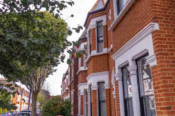 A row of modern terraced houses in Britain, pictured on a sunny day